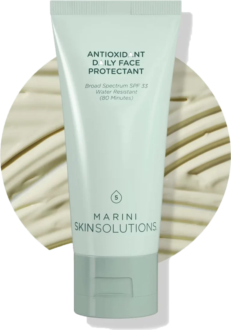 Light green tube labeled Antioxidant Daily Face Protectant by Marini SkinSolutions against a soft botanical background.