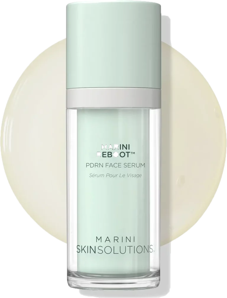 Marini SkinSolutions Reboot PDRN Face Serum bottle with a pale green cap and clear container against a light circular background.