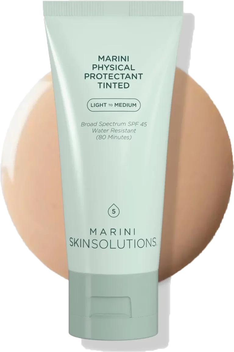 Mint green tube labeled Marini Physical Protectant Tinted Light to Medium in front of a beige tint swatch.
