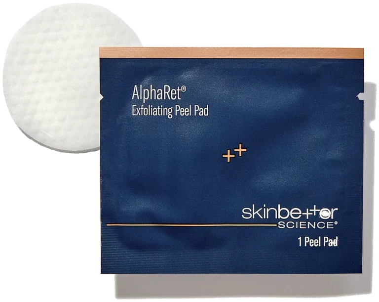 SkinBetter Science AlphaRet Exfoliating Peel Pads packet and textured round pad.
